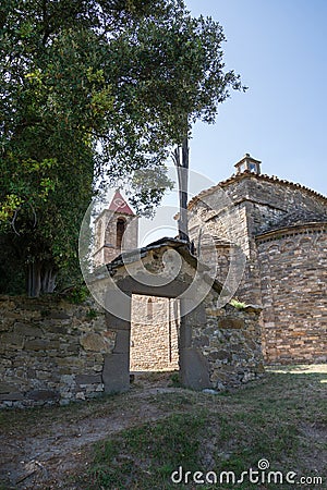 View of the entrance to the 10th century church of Sant Joan de FÃ bregas in Rupit, Catalonia Stock Photo